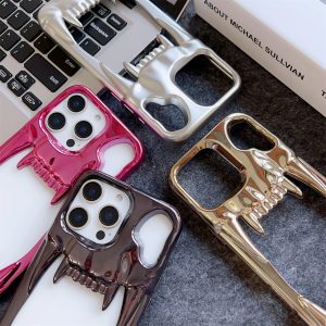 Electroplated Tiger-tooth Skull Phone Case With 15 Cutouts
